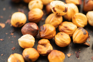 Hazelnuts roasted in an oven. Close up.