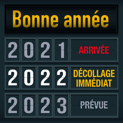 Fototapeta premium Carte de vœux 2022 avec un message décalé, montrant un tableau d’affichage d’aéroport pour illustrer le passage dans la nouvelle année.