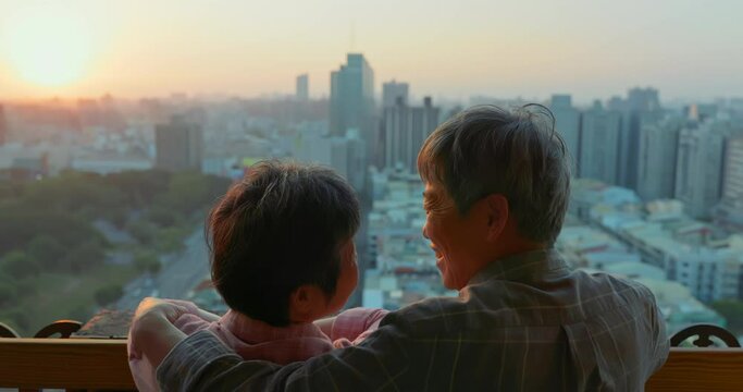 senior couple looking outside