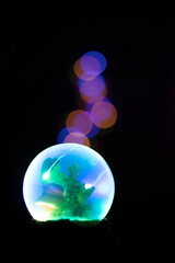 Bola de nieve papa noel con efecto bokeh