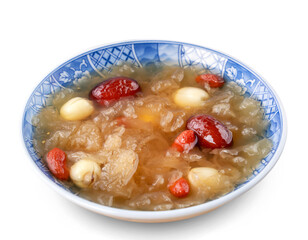 Sweet snow white fungus soup with lotus seed isolated on white background
