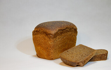 Sliced fresh black bread with cumin