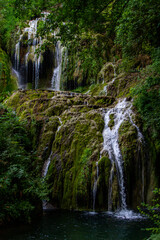 Fototapeta na wymiar Krushuna Falls are a series of waterfalls in northern Bulgaria, near Lovech. 