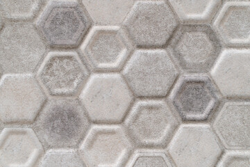 Abstract seamless pattern, gray ceramic tiles floor. Concrete hexagonal paver blocks