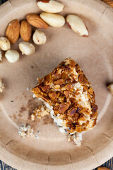 sweet cake with buttercream and sponge cake and lots of poppy seeds and nuts