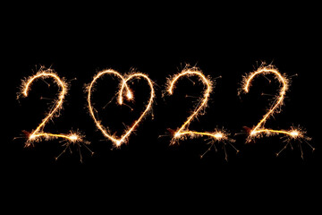 2022 written with Sparkle firework on black background, happy new year 2020 concept