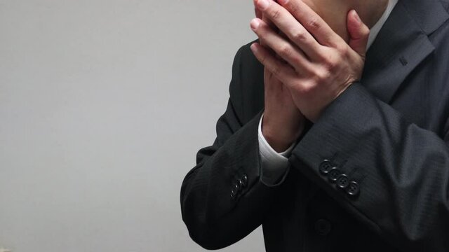 驚く日本人ビジネスマン