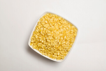 Top View of Moong Dal Namkeen in Bowl Isolated on White Background