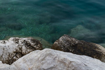 Landscape of rocky sea shore and ripply water, detail form Adriatic sea coast