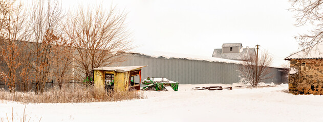 New buildings and old buildings grain storage hangars in the countryside of Ukraine