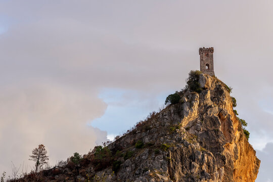 The Upezzinghi tower in Caprona against a dramatic sky, Pisa, Tuscany, Italy