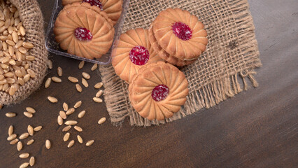 Fototapeta na wymiar Top view of Sweet jam biscuits. Sandwich biscuits or Cream biscuits isolated.