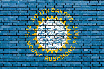 flag of South Dakota, USA painted on brick wall