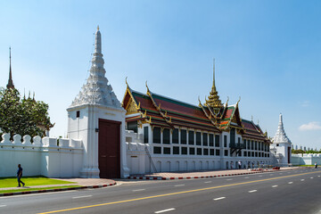 The walls of the Grand Palace with the Deva Phithak Gate and Gate of Sak Chaisit, Bangkok, Thailand.