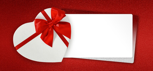 valentines day gift card, heart shaped box with red ribbon bow and white ticket for copy space isolated on red glittering background, top view and also great for mother's day greetings