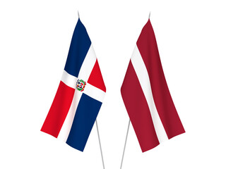 National fabric flags of Latvia and Dominican Republic isolated on white background. 3d rendering illustration.