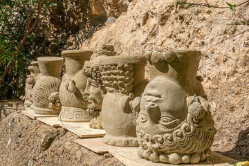 clay heads drying in the sun

