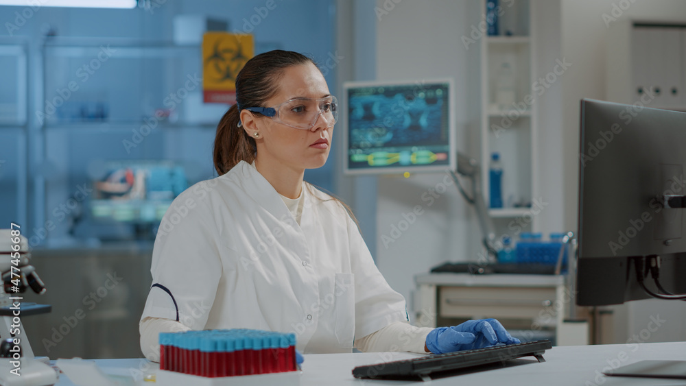 Aufkleber portrait of researcher working on computer in science laboratory, using technology to work on lab ex