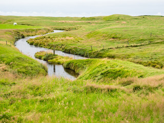 Scenic landscape at historic Keldur farm, home to one of the oldest turf houses in Iceland