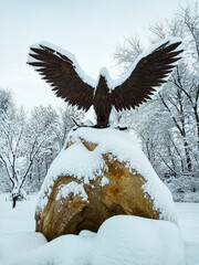Bronze eagle in the snow