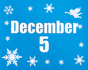 December 5th. Winter blue background with snowflakes, angel and a calendar date. Day 5 of month.