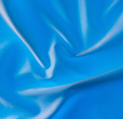 Blue fabric material as an abstract background.