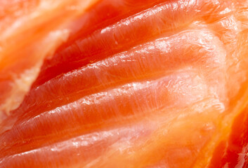Red fish fillet as background.