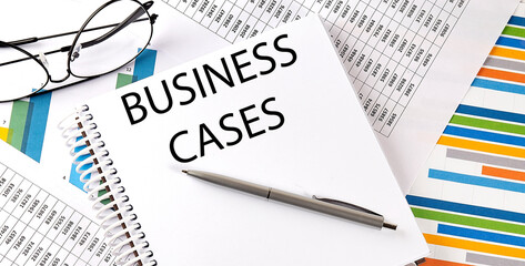 BUSINESS CASES , pen and glasses on the chart, business concept