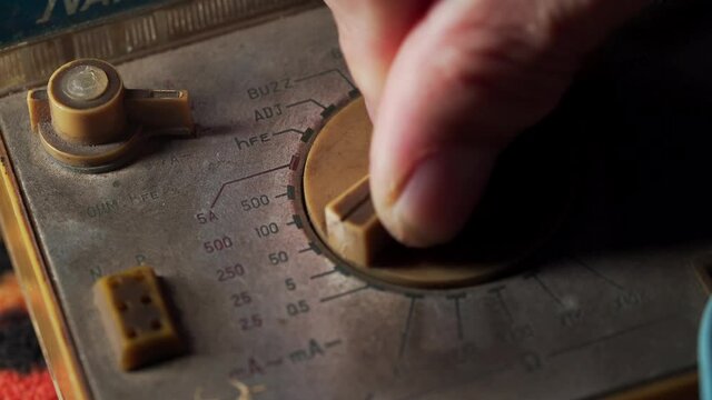 Old-fashioned pointer multimeter measurement