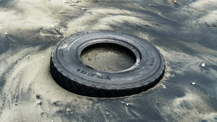 Tyre buried in the Sand