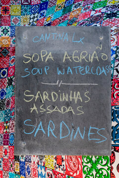 Menu listing soup and sardines. Lisbon, Portugal