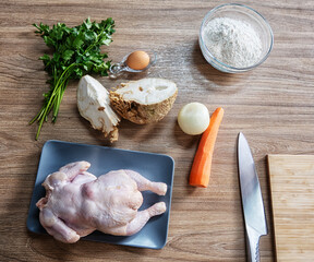cooking poultry close-up in the interior of a home kitchen. Homemade food.  Cooking chicken at home. Close-up, selective focus.