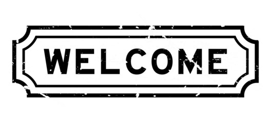 Grunge black welcome word rubber seal stamp on white background