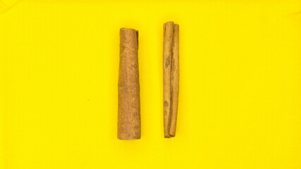 
Cinnamon, photo on a yellow background