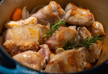 Rabbit casserole recipe with olives and herbs, sauteed potatoes. High quality photo