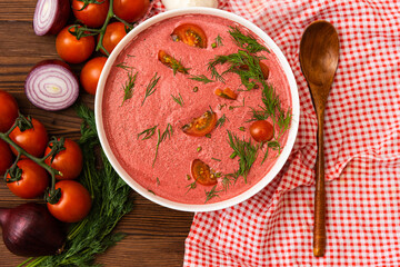 Soup puree of fresh cherry tomatoes.  vegetarian dish made from natural vegetables. healthy food. top view.
