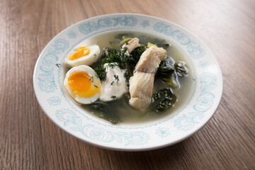 cooking fish soup in the home kitchen. Fish soup is a traditional dish for coastal residents. Home cooking. Homemade dish.