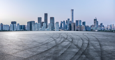 Fototapeta premium Panoramic skyline and modern commercial office buildings with empty road in Beijing, China.