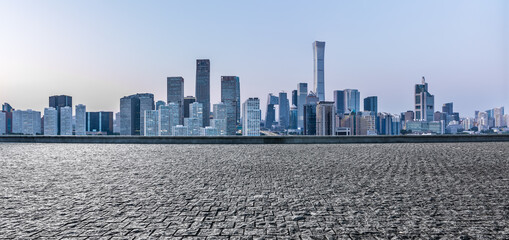 Panoramic skyline and modern commercial office buildings with empty square floors in Beijing