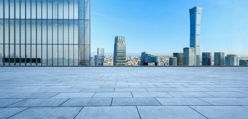 Fototapeta premium Panoramic skyline and modern commercial office buildings with empty square floors in Beijing