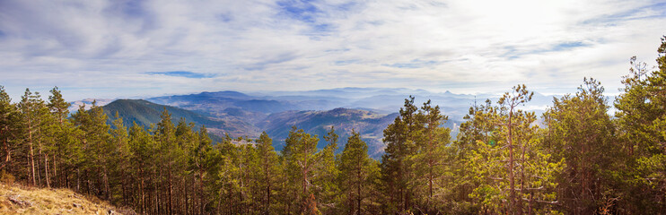 Misty mountain landscape. Beautiful nature, landscape panorama view of foggy peaks. Autumn season. Day light. Mountain Zlatibor, Serbia.