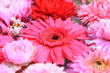 Obraz na płótnie Canvas フラワーアレンジメント　ピンクの花