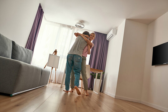 Young lesbian european girls hugging and dancing