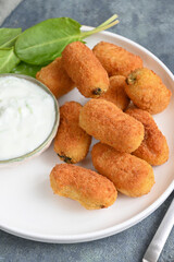 Chicken croquet with spinach with yogurt sauce