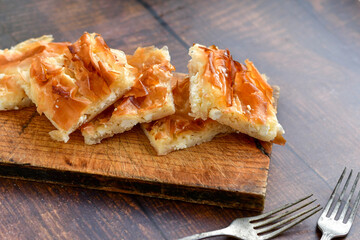 Bakery .Home made  cheese pie  with phyllo pastry, feta cheese  and organic eggs. Bulgarian banitsa