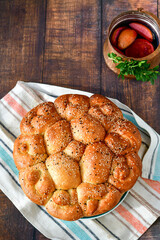 Close-up of fresh  traditional  artisan homemade round  bread . Bulgarian tradional holiday bread