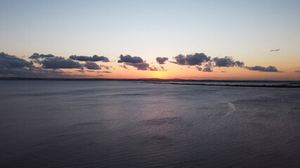 Obraz premium sunset over the river