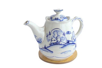 Porcelain teapot with lid on wooden stand, isolated on white background. 