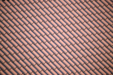 Closeup of house roof top covered with metallic shingles