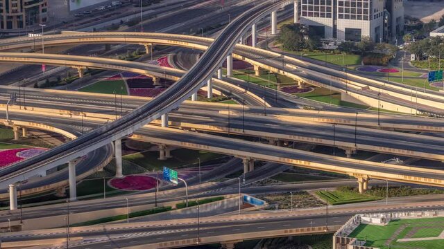 Highway intersection and overpass of Dubai downtown aerial timelapse.